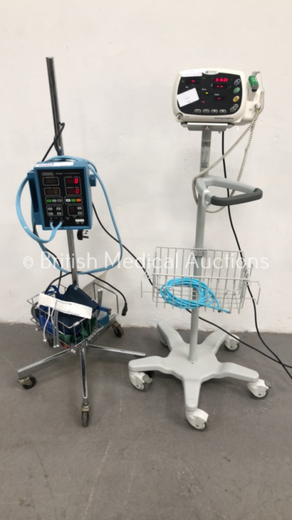 1 x Huntleigh SmartSigns LitePlus Vital Signs Monitor on Stand and 1 x Critikon Dinamap 8100T Vital Signs Monitor on Stand (Both Power Up)