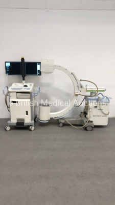 Siemens Arcadis Varic Mobile X-Ray C-Arm Model No 1014406 *S/N 17008* ***Mfd 2014*** with Dual Screen Image Intensifier (Powers Up with Key - Key Included - Exposure Taken - Blank Image and Error Message on Screen)