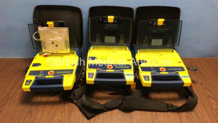 3 x Cardiac Science Powerheart AED G3 Automated External Defibrillators with Carry Cases (All Power Up with Stock Battery - Batteries Not Included) *4109982 / 4109971 / 4412693*