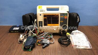 Medtronic Lifepak 12 Biphasic Defibrillator / Monitor with Screen Protector, ECG, Paddle, NIBP and SpO2 Leads, MTCDP-H5 Module, 1 x Battery and CO2 Option *Mfd 2009* (Powers Up) *37797924*