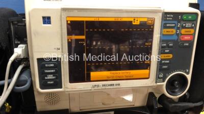 Medtronic Lifepak 12 Biphasic Defibrillator / Monitor with Screen Protector, ECG, Paddle, NIBP and SpO2 Leads, MTCDP-H5 Module, 1 x Battery and CO2 Option *Mfd 2009* (Powers Up) *37797924* - 2