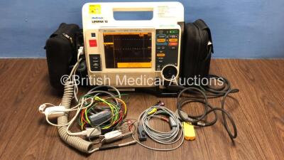 Medtronic Lifepak 12 Biphasic Defibrillator / Monitor with Screen Protector, ECG, Paddle, NIBP and SpO2 Leads, 1 x Battery and CO2 Option *Mfd 2009* (Powers Up) *37628610*