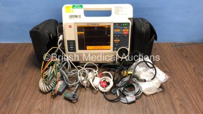 Medtronic Lifepak 12 Biphasic Defibrillator / Monitor with Screen Protector, ECG, Paddle, NIBP and SpO2 Leads, 1 x Battery and CO2 Option *Mfd 2009* (Powers Up) *37620275*