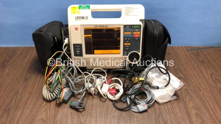 Medtronic Lifepak 12 Biphasic Defibrillator / Monitor with Screen Protector, ECG, Paddle, NIBP and SpO2 Leads, 1 x Battery and CO2 Option *Mfd 2009* (Powers Up) *37620275*
