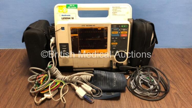 Medtronic Lifepak 12 Biphasic Defibrillator / Monitor with Screen Protector, ECG, Paddle, NIBP and SpO2 Leads, 1 x Battery and CO2 Option *Mfd 2009* (Powers Up) *37797945*
