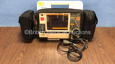 Medtronic Lifepak 12 Biphasic Defibrillator / Monitor with Screen Protector, Paddle Lead, 1 x Battery and CO2 Option *Mfd 2009* (Powers Up) *37620268*