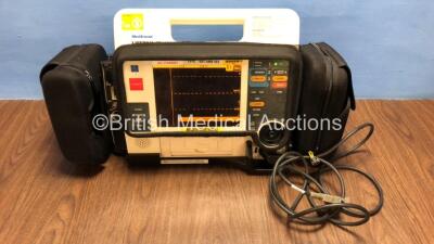 Medtronic Lifepak 12 Biphasic Defibrillator / Monitor with Screen Protector, Paddle Lead, 1 x Battery and CO2 Option *Mfd 2009* (Powers Up) *37628597*