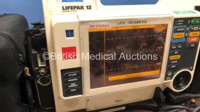 Medtronic Lifepak 12 Biphasic Defibrillator / Monitor with Screen Protector, Paddle Lead, 1 x Battery and CO2 Option *Mfd 2009* (Powers Up) *37620282* - 2