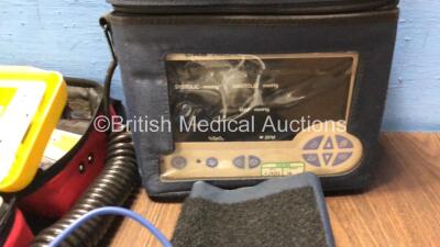 Mixed Lot Including 1 x Access ALS Automated External Defibrillator (Powers Up with Loose Battery Clip-See Photo) 1 x Max NIBP CAS 740 Vital Signs Monitor (No Power) 1 x EZ IO G3 Carry Bag, 8 x Merlin Medical BP Meters and 2 x Ferno Belts - 4