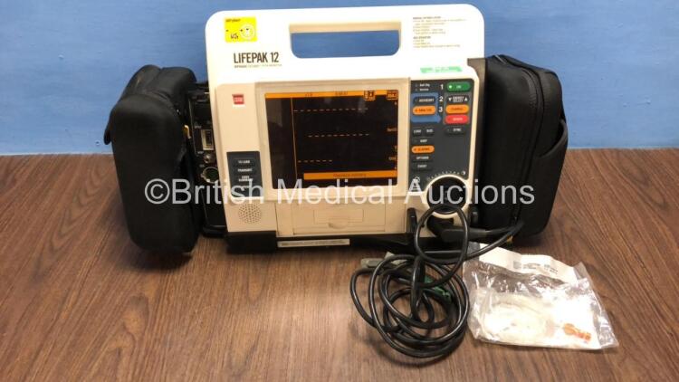 Medtronic /Physio Control Lifepak 12 Biphasic Defibrillator / Monitor with Screen Protector, Paddle Lead, 1 x Battery and CO2 Option *Mfd 2009* (Powers Up) *37797951*#