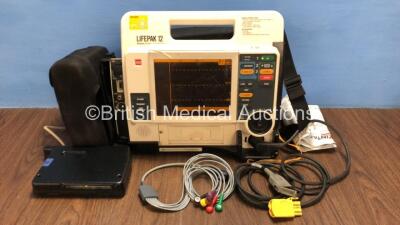 Medtronic /Physio Control Lifepak 12 Biphasic Defibrillator / Monitor with Screen Protector, Paddle Lead, 1 x Battery, 1 x MTCDP-H5 Module and CO2 Option *Mfd 2009* (Powers Up) *377
