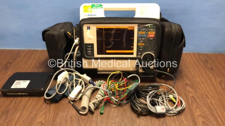 Medtronic Lifepak 12 Biphasic Defibrillator / Monitor with Screen Protector, ECG, Paddle, NIBP and SpO2 Leads, MTCDP-H5 Module, 1 x Battery and CO2 Option *Mfd 2009* (Powers Up) *37797935*