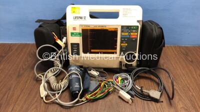 Medtronic Lifepak 12 Biphasic Defibrillator / Monitor with Screen Protector, ECG, Paddle, NIBP and SpO2 Leads,1 x Battery and CO2 Option *Mfd 2009* (Powers Up) *37797930*