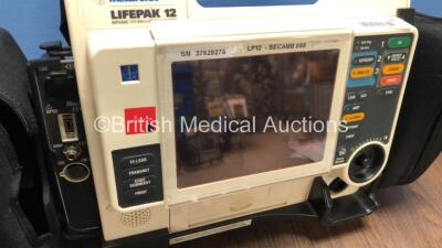 Medtronic Lifepak 12 Biphasic Defibrillator / Monitor with Screen Protector, 1 x Battery and CO2 Option *Mfd 2009* (Powers Up) *37620276* - 2