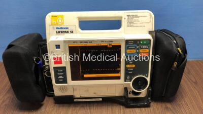 Medtronic Lifepak 12 Biphasic Defibrillator / Monitor with Screen Protector and 1 x Battery*Mfd 2009* (Powers Up) *37632499*