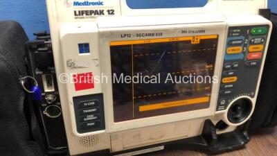 Medtronic Lifepak 12 Biphasic Defibrillator / Monitor with Screen Protector and 1 x Battery*Mfd 2009* (Powers Up) *37632499* - 2