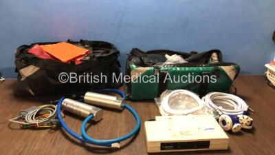 Mixed Lot Including 2 x Hartwell Medical Pump / Valves, 4 x Hoses, 2 x N20 Hoses, 1 x Oxygen Carry Bag with First Aid Supplies and 1 x Medtronics Physio Control DC Power Adapter