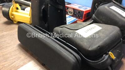 Mixed Lot Including 1 x Dlouhy Lifepak 15 Bracket, 3 x Stryker 6500-101-010 Batteries with 1 x Stryker SMRT Battery Charger, 1 x Vulcan Flashlight, 1 x Draper Warning Triangle, 1 x paraPAC 200D Ventilator and 3 x Lifepak 15 Carry Cases *162378 / 16161 / 1 - 7