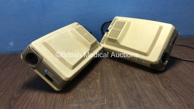 2 x Nidek CP-670 Auto Chart Projector (Both Power Up - Both Casings Damaged - Loose) *S/N 270490 / 270831* **Mfd 2000 / 1998**