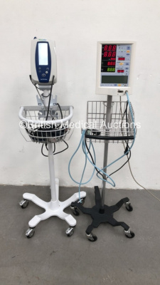 1 x Welch Allyn SPOT Vital Signs Monitor on Stand with BP Hose and 1 x Datascope Accutorr Plus Vital Signs Monitor on Stand with BP Hose (Both Power Up) *S/N 201309632 / A732339-K3*