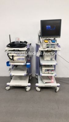 2 x Olympus Stack Trolleys with Olympus OEV191H Monitor, Olympus ESG-100 Electrosurgical Unit, Olympus KV-5 Suction Pump, Olympus OES UHI-3 Insufflator, Olympus ECS-260 Connector Cable, Olympus MAJ-1154 Pigtail Connector, Olympus Evis Lucera CV-260SL Digi