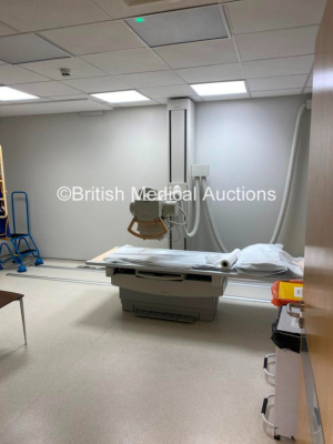 Philips Optimus 65 floor mounted X-ray System Including Chest Stand, Patient Table and Rails. Manufactured 2006. The System has been Professionally De-Installed *20-1112*