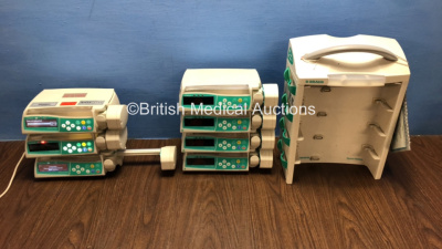 Job Lot of 7 x B.Braun Perfusor Space Modular Infusion Systems (All Power Up with 4 x Damaged Displays) with 7 x Batteries, 1 x B.Braun Space Station and 1 x DC Power Supply *76525 / 274278 / 274256 / 274452 / 274390 / 273232 / 274233*
