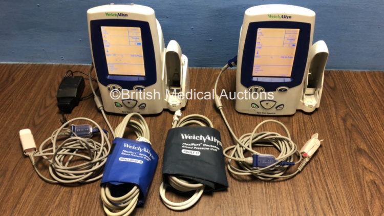 2 x Welch Allyn Spot Vital Signs LXi Monitors with 2 x Power Supply, 2 x BP Hoses and 2 x Cuffs with Leads (Both Power Up)