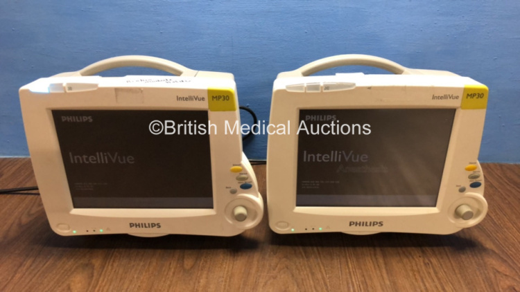 2 x Philips Intellivue MP30 Touch Screen Patient Monitors Version G.01.80 / D.00.58 (Both Power Up, 1 x Broken Module Holder, 1 x Cracked Casing) *Mfd 2006 N/A* **DE54019634 / N/A**