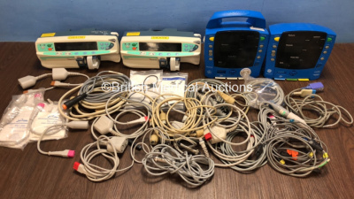 Mixed Lot Including 2 x Cardinal Health Alaris PK Syringe Pumps (No Power) 1 x GE ProCare and 1 x GE Carescape V100 Dinamap Patient Monitors with Various Monitor Leads