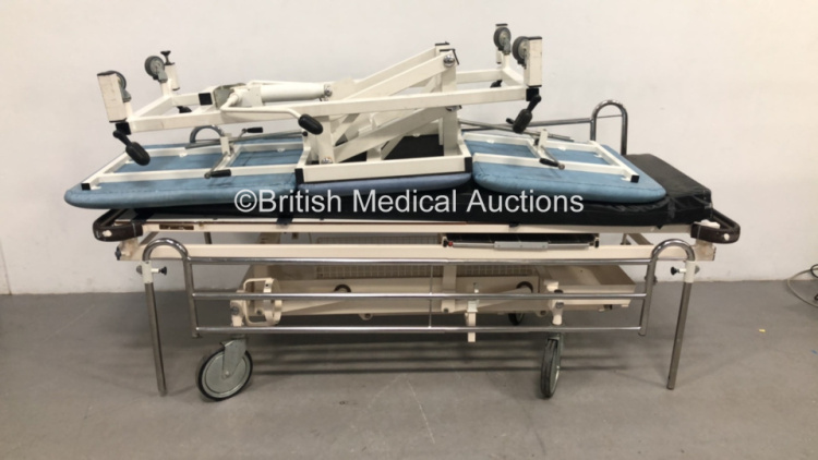 1 x Huntleigh Nesbit Evans Hydraulic Patient Trolley with Mattress and 1 x Hydraulic 3 Way Patient Examination Couch