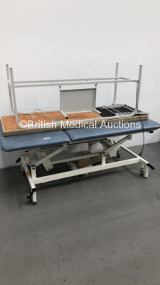1 x Huntleigh Akron Electric Bariatric Patient Examination Couch with Controller and 1 x Unknown Make Static Patient Examination Couch - 2