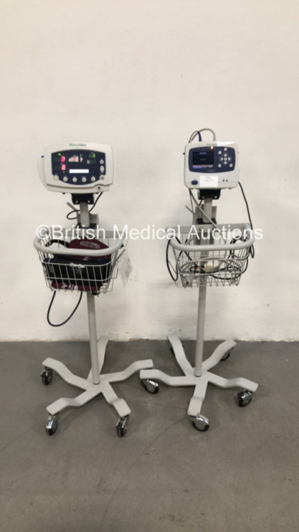 1 x Welch Allyn ProPaq LT Patient Monitor on Stand with 1 x BP Hose and 1 x SpO2 Finger Sensor and 1 x Welch Allyn 53NT0 Patient Monitor on Stand with 2 x BP Cuffs (Both Power Up) * SN KA006171 / JA079354 *