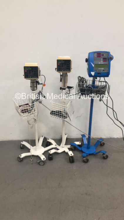 1 x GE Dinamap Pro 300 Patient Monitor on Stand with 1 x SpO2 Finger Sensor and 1 x BP Cuff and Hose and 2 x Criticare 506DXN Comfort Cuff Patient Monitors on Stands with 2 x BP Hoses,2 x BP Cuffs and 2 x SpO2 Finger Sensors (All Power Up) * SN 400385589