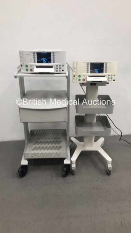 2 x Huntleigh SonicAid FM800 Encore Fetal Monitors on Stands (Both Power Up) * SN 751DX0100094-09 / 751DX0300438-10 *