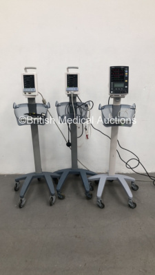 2 x Datascope Duo Patient Monitors on Stands with 2 x SpO2 Finger Sensors and 1 x Mindray Datascope Accutorr V Patient Monitor on Stand with 1 x SpO2 Finger Sensor (All Power Up) * SN A7508115K0 / MD02772-D5 / MD09698-B9 *