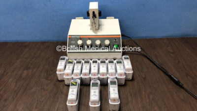 Mixed Lot Including 1 x HMS Indotrac Traction Unit (Powers Up) 12 Braun Welch Allyn Thermoscan Thermometers with Base Units (All Untested Due to Possible Flat Batteries)