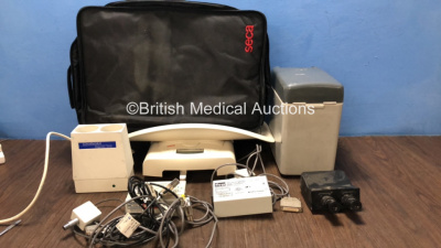 Mixed Lot Including 1 x Seca 385 Weighing Scales in Carry Bag (Power Up) 1 x FMS 4222-05 Hand Control Interface, 1 x FMS 282205 Hand Control Interface, 1 x Sonarwarm Diagnostic Sensor Charger (No Power) 1 x Leitz Wetzlar 512 582