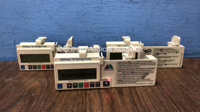 1 x CME Medical T34 Syringe Pump and 1 x McKinley T34 Syringe Pumps (All Power Up when Tested with Doner Battery-Batteries Not Included, 1 Missing Battery Cover)