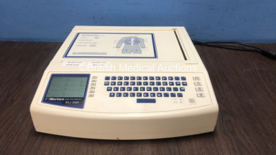 Mortara Instrument ELI 250 Electrocardiograph Machine (Powers Up)