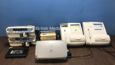 Mixed Lot Including 2 x Carefusion Alaris CC Syringe Pumps (Both Power Up) 1 x B&D Electromedical Nippy 3+ Battery, 1 x Vitalograph Pump, 1 x Canon DR-C130 Image Formula Unit with 1 x AC Power Supply (Powers Up) 2 x Siemens DCA Vantage Analyzers (Both Pow