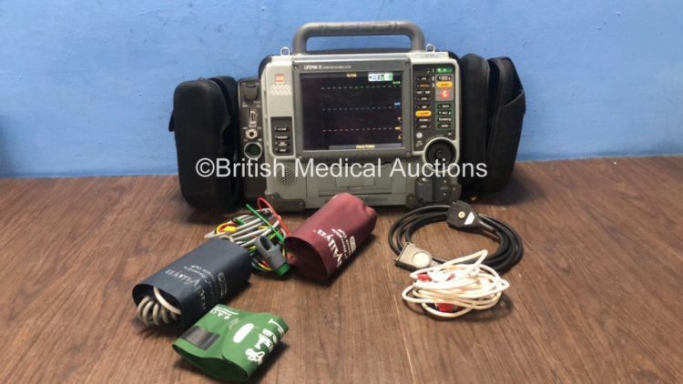 Medtronic Physio-Control Lifepak 15 12-Lead Monitor / Defibrillator *Mfd - 2009* Ref - 99577-000025 P/N - V15-2-000030 Software Version 3207410 with Pacer, CO2, SPO2, NIBP, ECG and Printer Options, 4 and 6 Lead ECG Leads, SPO2 Finger Sensor, NIBP Cuff and