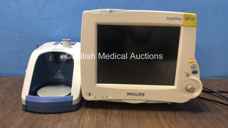 Mixed Lot Including 1 x Fisher & Paykel Airvo 2 Humidifier Unit (Powers Up) 1 x Philips IntelliVue MP30 Patient Monitor (Holds Power, Unable to Test Due to Faulty Power Button-See Photo) *170109042555 / DE54019637*