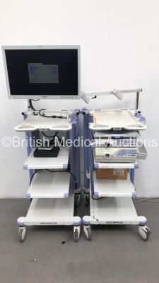 2 x Olympus Stack Trolleys Including Olympus OEV261H Monitor,Olympus Evis Lucera CV-260SL Proccessor,Olympus Evis Lucera CLV-260SL Light Source Unit/Proccessor and Olympus Keyboard (Powers Up) * SN 7241542 / 7813446 / 7129831 *