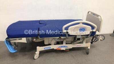 Hill-Rom Affinity 4 Electric Birthing Bed Model P3700B000063 with Cushions and Stirrups (Powers Up) *S/N M083AA5358*