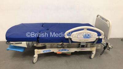 Hill-Rom Affinity 4 Electric Birthing Bed Model P3700B000063 with Cushions and Stirrups (Powers Up) *S/N J206AA9411*