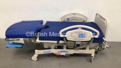 Hill-Rom Affinity 4 Electric Birthing Bed Model P3700B000063 with Cushions and Stirrups (Powers Up) *S/N M11AA5513*