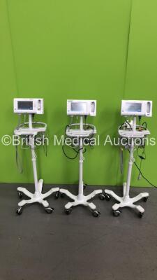 3 x Welch Allyn 75CE Patient Monitors on Stands with 3 x SpO2 Finger Sensors and 3 x BP Hoses (All Power Up) * SN 100043984115 / 100044084115 / 100044044115 *