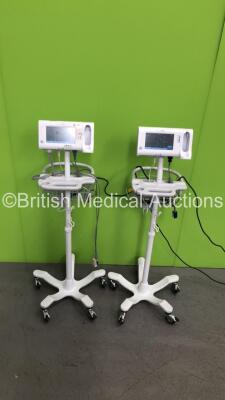 2 x Welch Allyn 75CE Patient Monitors on Stands with 2 x SpO2 Finger Sensors and 1 x BP Hose (Both Power Up) * SN 100043314115 / 100043884115 *