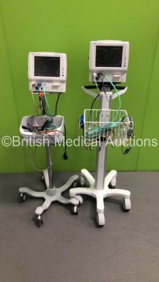 2 x Fukuda Denshi DS-7100 Patient Monitors on Stands with Assorted Leads (Both Power Up) * SN 50001981 / 50001799 *